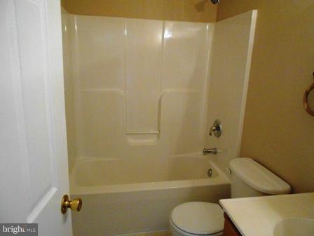 117 Michelle Drive Ranson, WV 25438 - Photo 16 of 24 a bathroom with a toilet and a bathtub