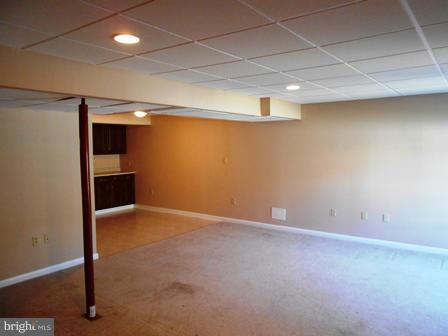 117 Michelle Drive Ranson, WV 25438 - Photo 23 of 24 an empty room with a empty space and windows