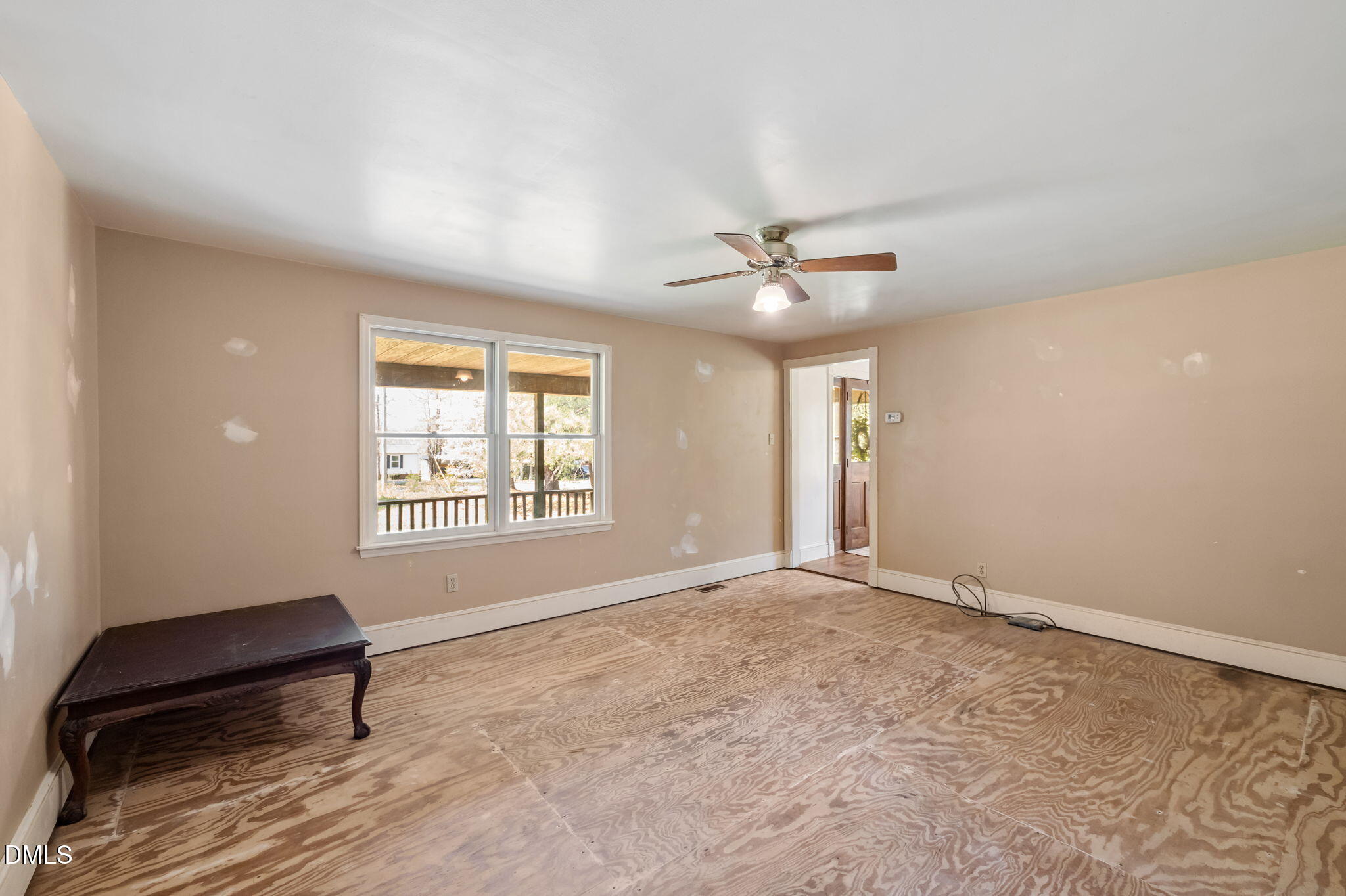 212 Thomas Humphries Road Roxboro, NC 27574 - Photo 21 of 56 a view of an empty room with a window