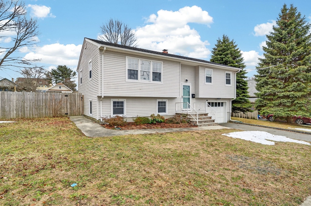 25 Morton Street Fairhaven, MA 02719 - Photo 1 of 34 a view of a house with backyard and sitting area