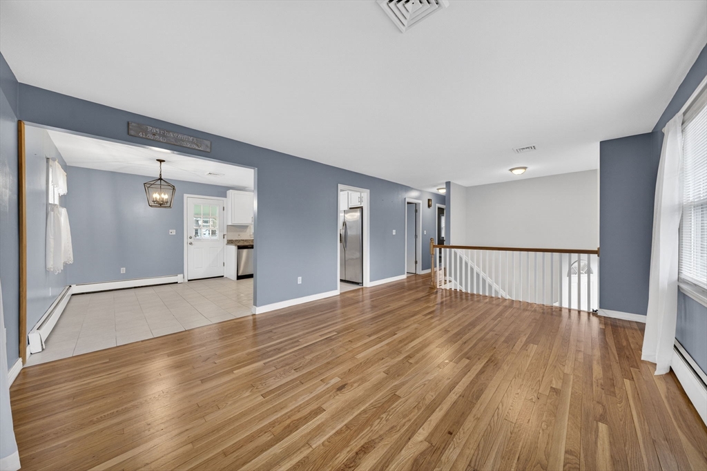 25 Morton Street Fairhaven, MA 02719 - Photo 13 of 34 a view of empty room with wooden floor
