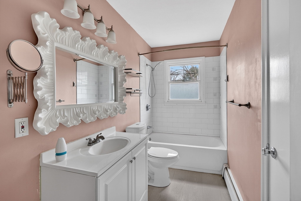 25 Morton Street Fairhaven, MA 02719 - Photo 19 of 34 a bathroom with a sink a toilet and shower