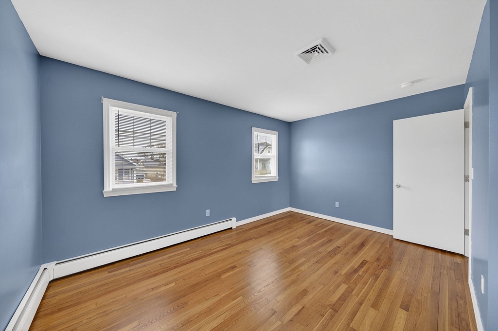 25 Morton Street Fairhaven, MA 02719 - Photo 21 of 34 a view of a room with wooden floor and window