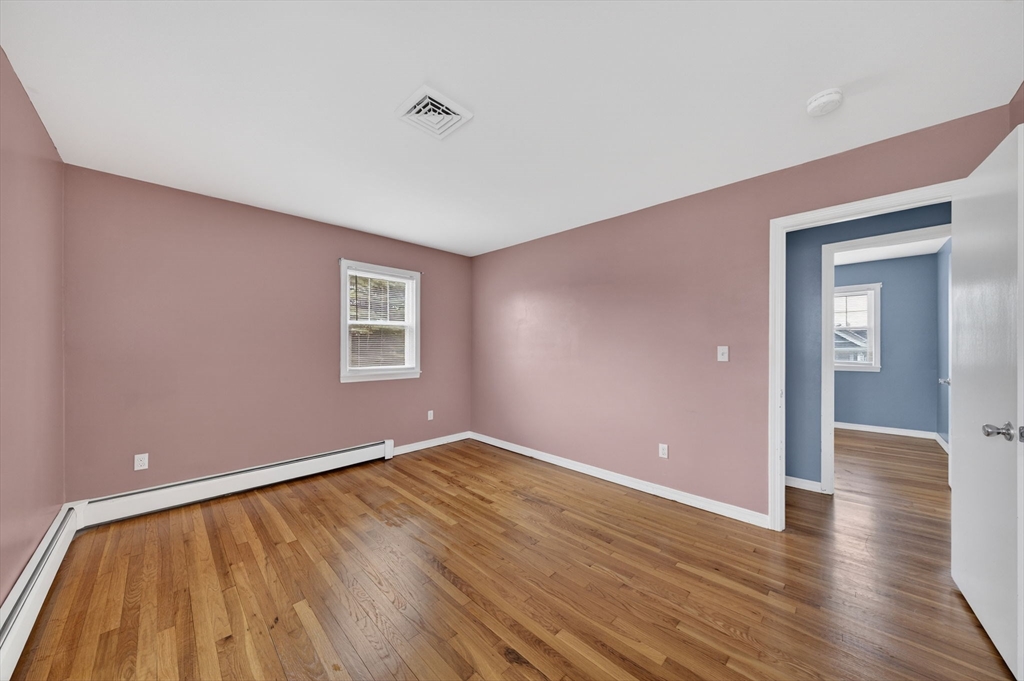 25 Morton Street Fairhaven, MA 02719 - Photo 23 of 34 a view of an empty room with wooden floor and a window