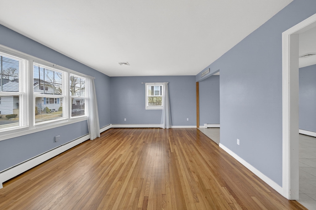 25 Morton Street Fairhaven, MA 02719 - Photo 24 of 34 a view of an empty room with wooden floor and a window