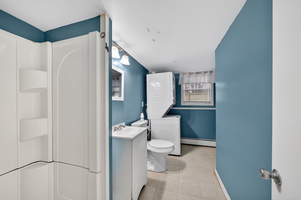 25 Morton Street Fairhaven, MA 02719 - Photo 29 of 34 a white toilet sitting next to a bathroom sink