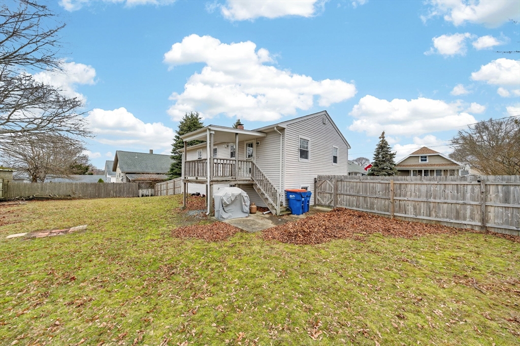 25 Morton Street Fairhaven, MA 02719 - Photo 6 of 34 a view of a house with a yard and sitting area