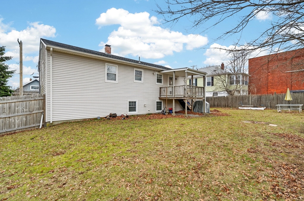 25 Morton Street Fairhaven, MA 02719 - Photo 8 of 34 a view of a house with a yard