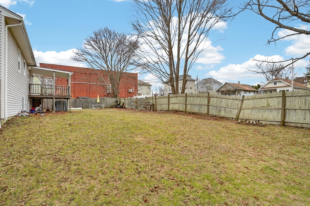 25 Morton Street Fairhaven, MA 02719 - Photo 9 of 34 a view of a yard with a house
