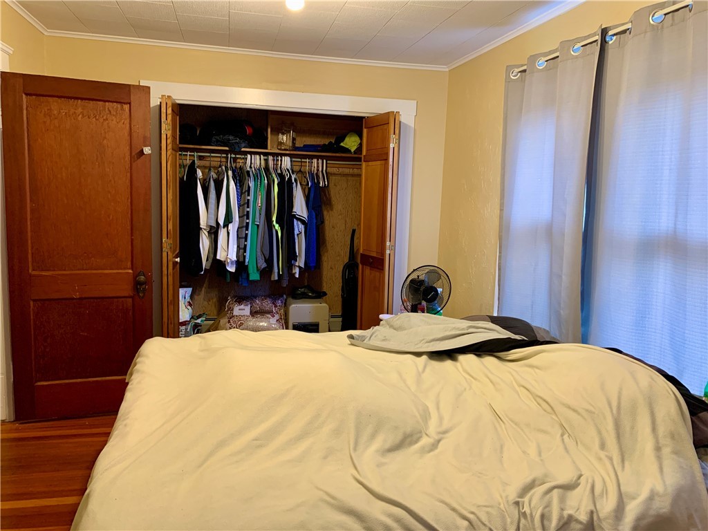 44 Mason Street Warren, RI 02885 - Photo 19 of 33 2nd floor master bedroom with double closets, wood floors.
