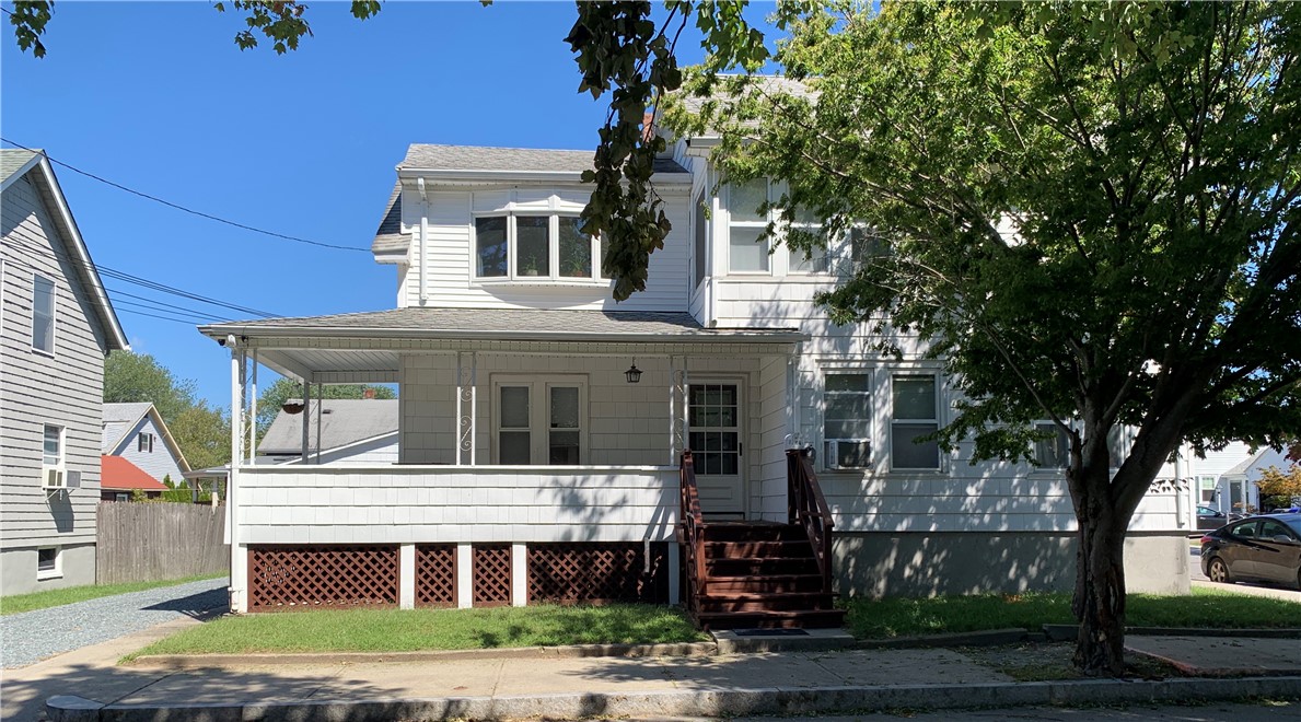44 Mason Street Warren, RI 02885 - Photo 25 of 33 New vinyl siding, large covered porch, replacement windows, corner lot, fenced yard, detached 2 car garage.