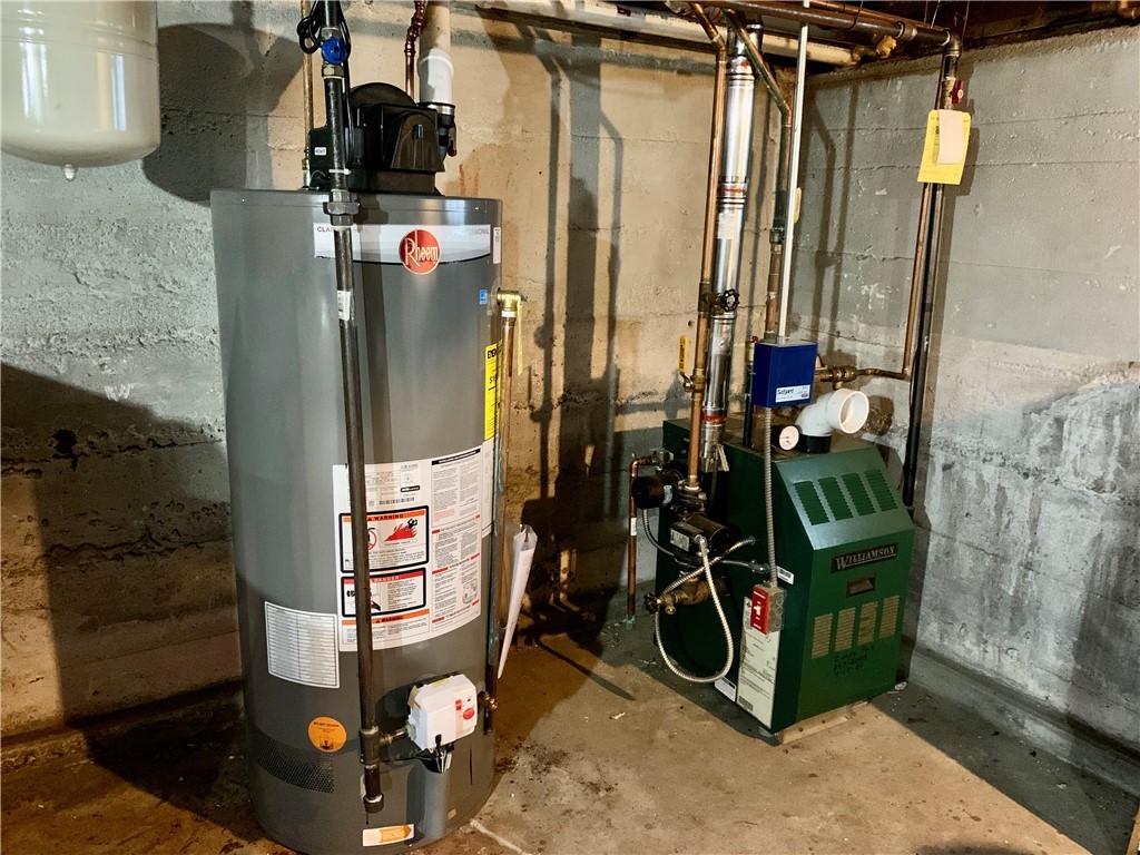 44 Mason Street Warren, RI 02885 - Photo 30 of 33 2nd floor gas heating with gas hot water tank.