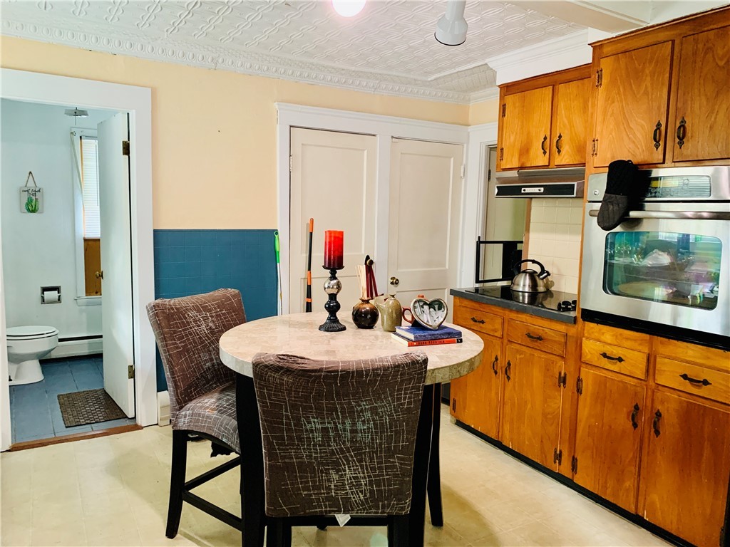 44 Mason Street Warren, RI 02885 - Photo 3 of 33 Large 1st floor kitchen offers great cabinet storage & counter space.