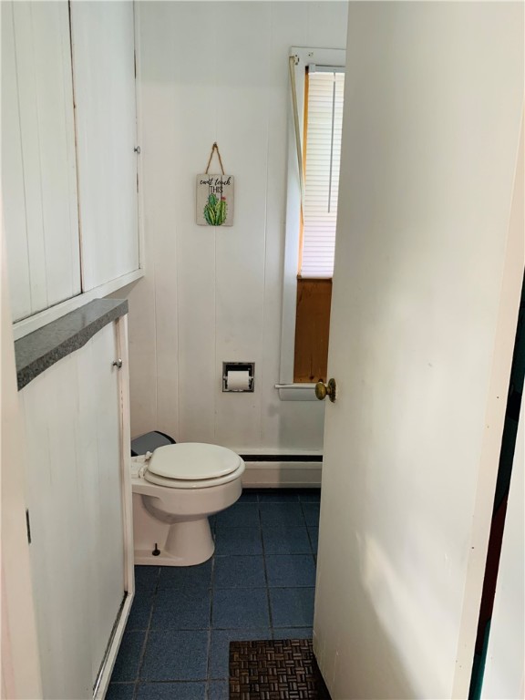 44 Mason Street Warren, RI 02885 - Photo 9 of 33 First floor tiled bathroom with shower stall.