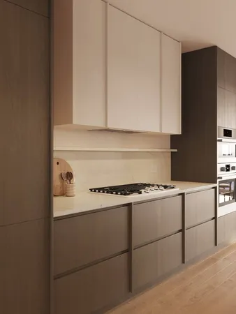 a kitchen with granite countertop cabinets and white appliances