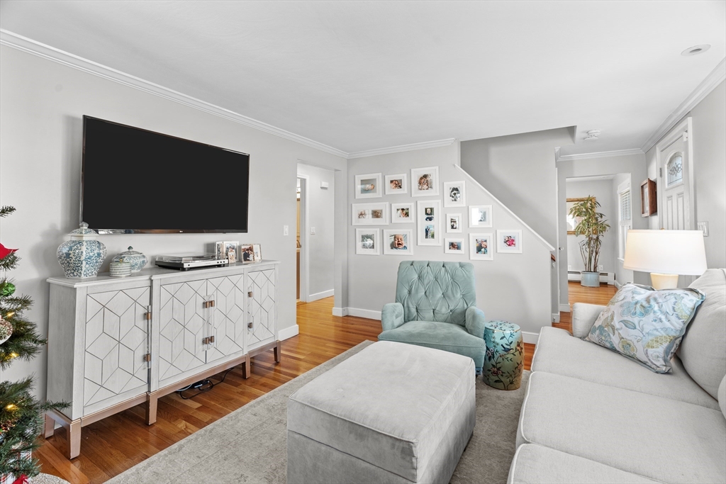 21 Oakvale Road Framingham, MA 01701 - Photo 15 of 42 a living room with furniture and flat screen tv