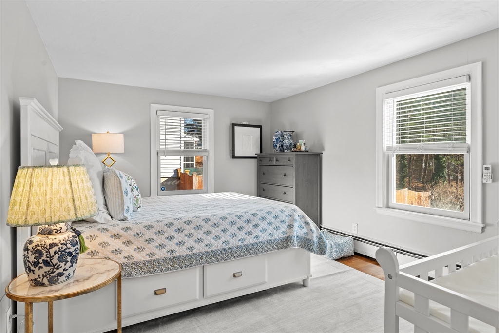 21 Oakvale Road Framingham, MA 01701 - Photo 20 of 42 a bedroom with a bed and a dresser