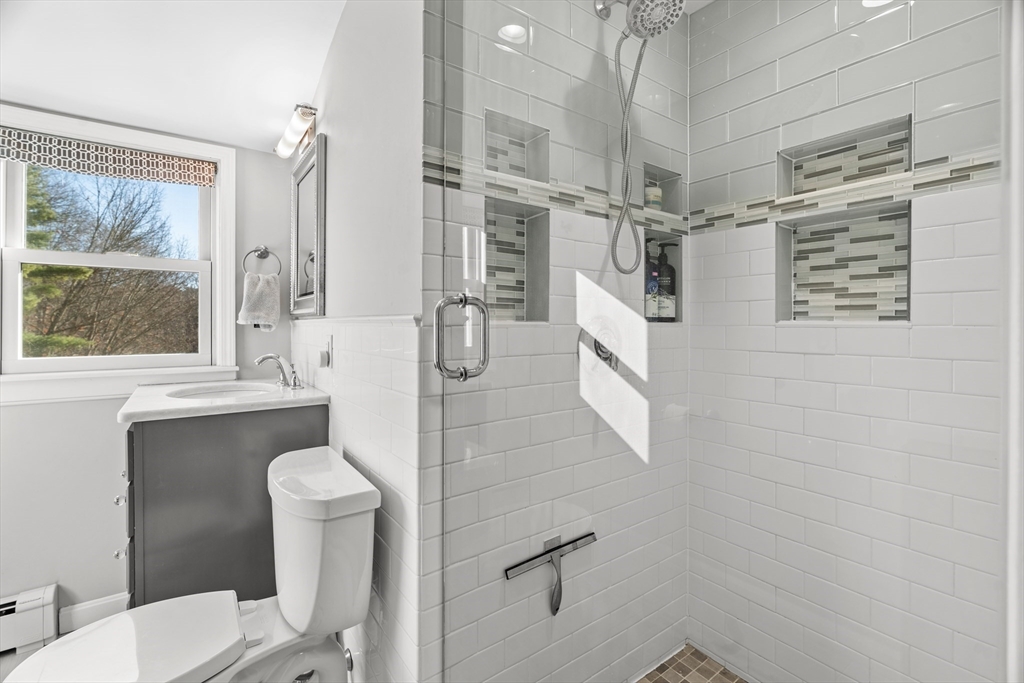 21 Oakvale Road Framingham, MA 01701 - Photo 30 of 42 a bathroom with a sink a toilet and shower