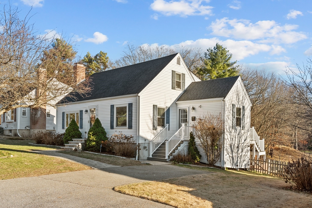 21 Oakvale Road Framingham, MA 01701 - Photo 3 of 42 a view of a house with a patio