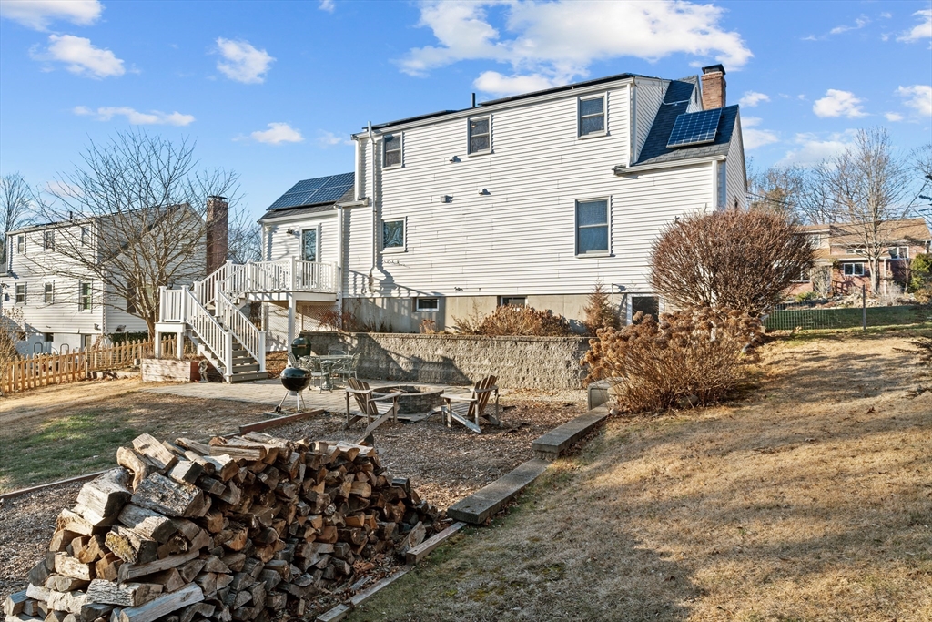 21 Oakvale Road Framingham, MA 01701 - Photo 34 of 42 a view of a yard with a large tree