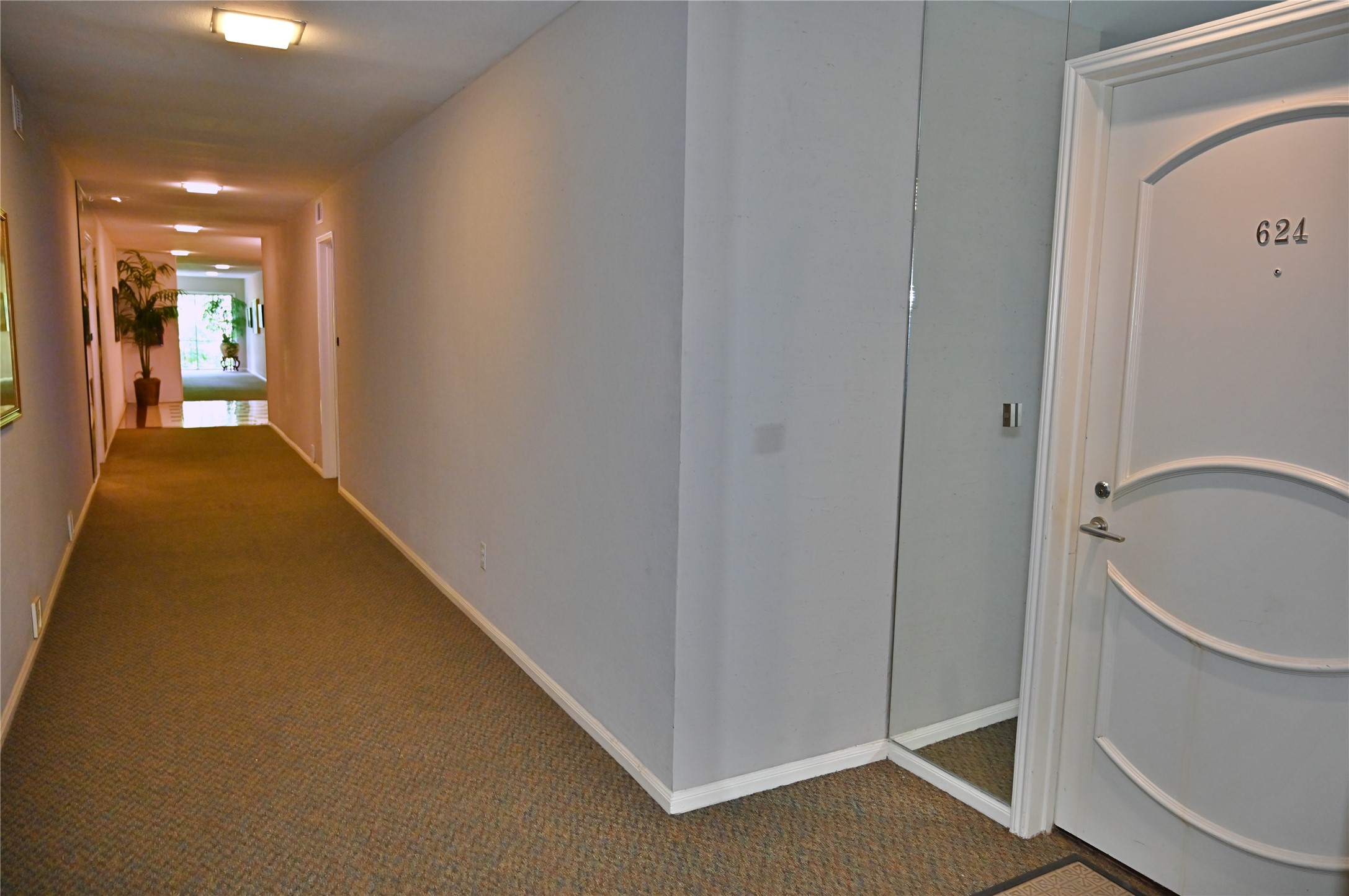 624 South Ripple Creek Drive, Unit 624 Houston, TX 77057 - Photo 22 of 30 a view of a hallway with a room