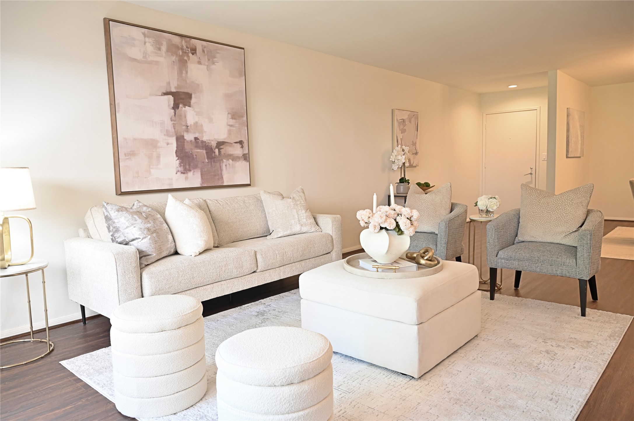 624 South Ripple Creek Drive, Unit 624 Houston, TX 77057 - Photo 4 of 30 a living room with furniture and a painting