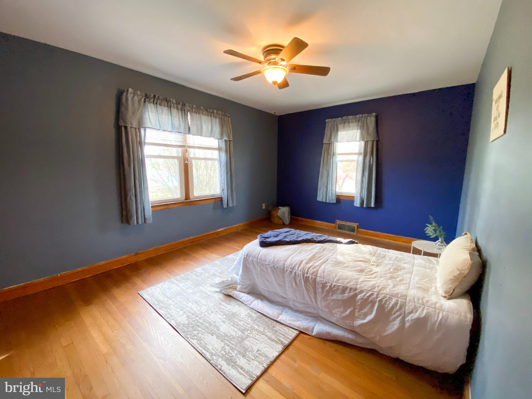 1026 Green Valley Road New Windsor, MD 21776 - Photo 15 of 57 a bedroom with bed and window