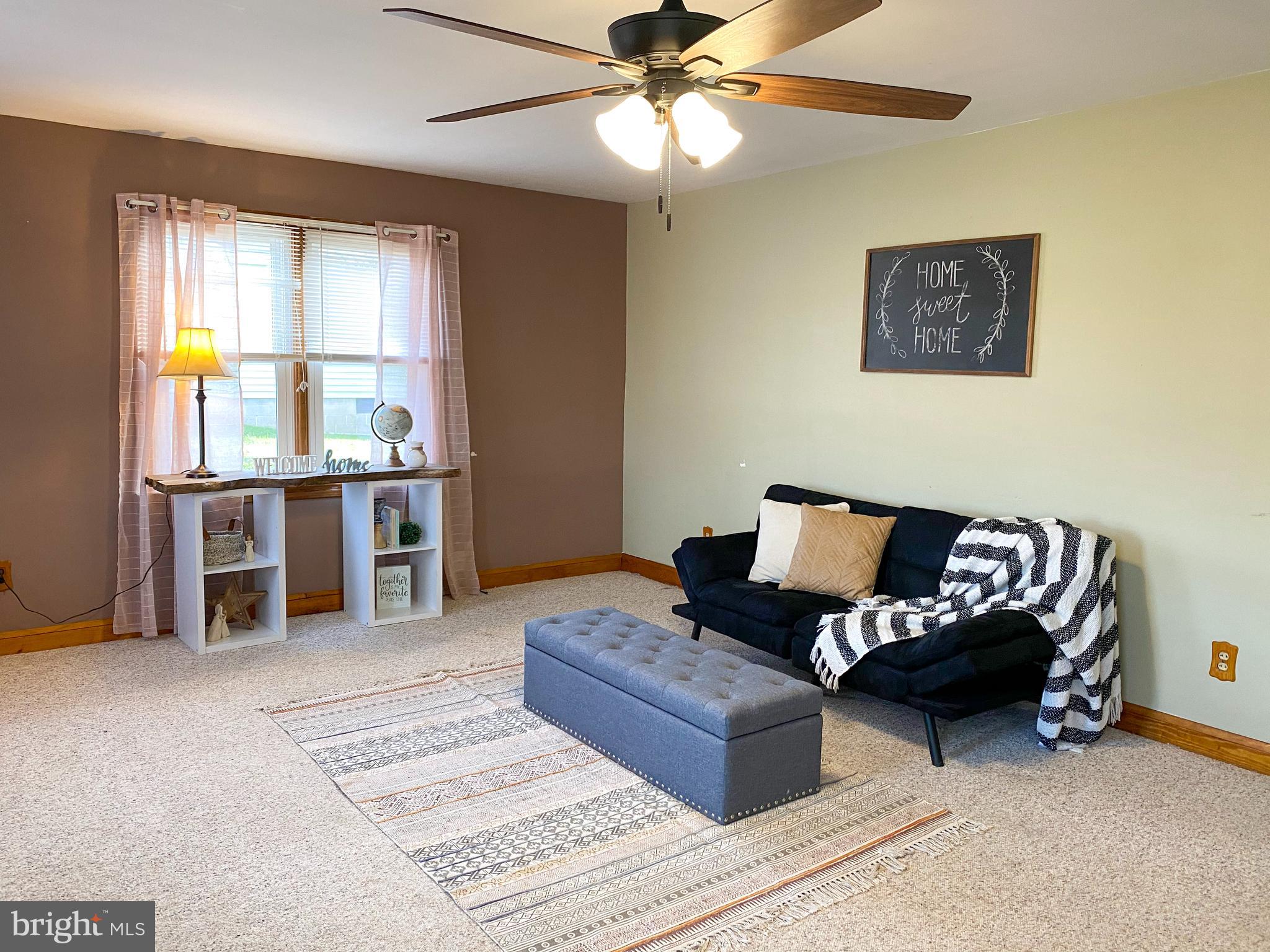 1026 Green Valley Road New Windsor, MD 21776 - Photo 20 of 57 a living room with furniture and window