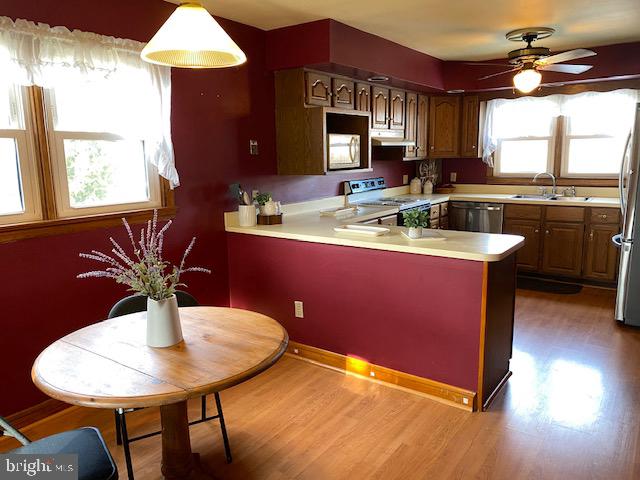 1026 Green Valley Road New Windsor, MD 21776 - Photo 27 of 57 a dining table with chairs and window