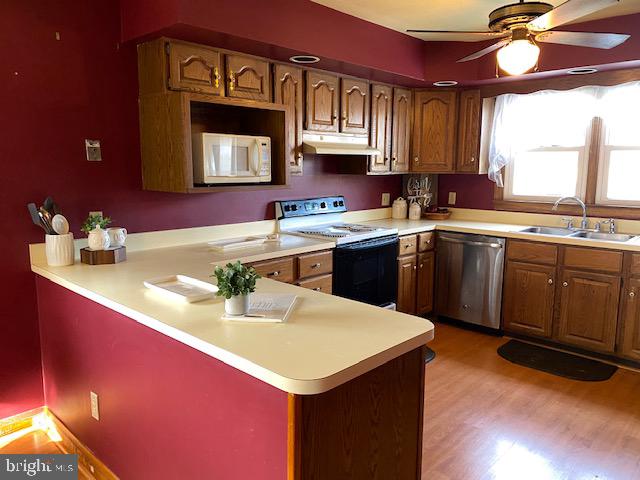 1026 Green Valley Road New Windsor, MD 21776 - Photo 28 of 57 a kitchen with a sink cabinets and window