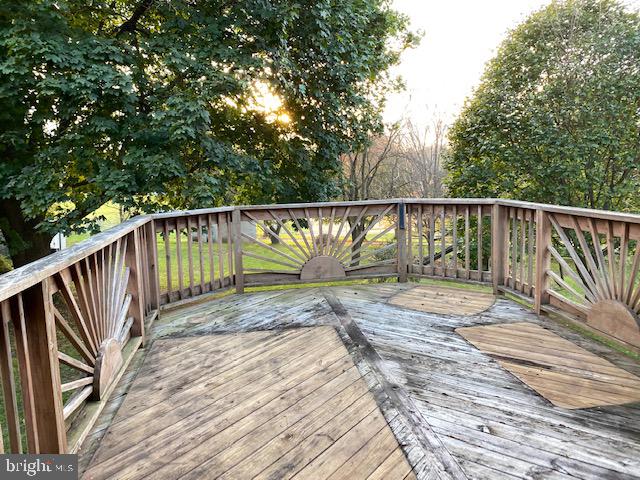 1026 Green Valley Road New Windsor, MD 21776 - Photo 31 of 57 a view of balcony with wooden floor and fence