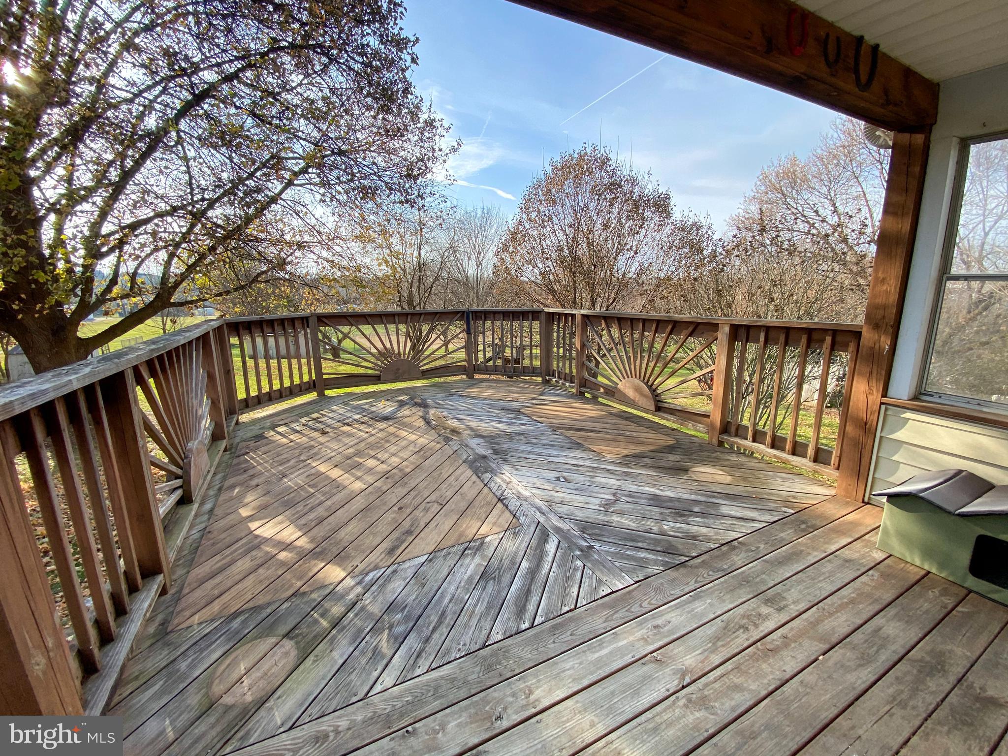 1026 Green Valley Road New Windsor, MD 21776 - Photo 49 of 57 a view of balcony with wooden floor and fence
