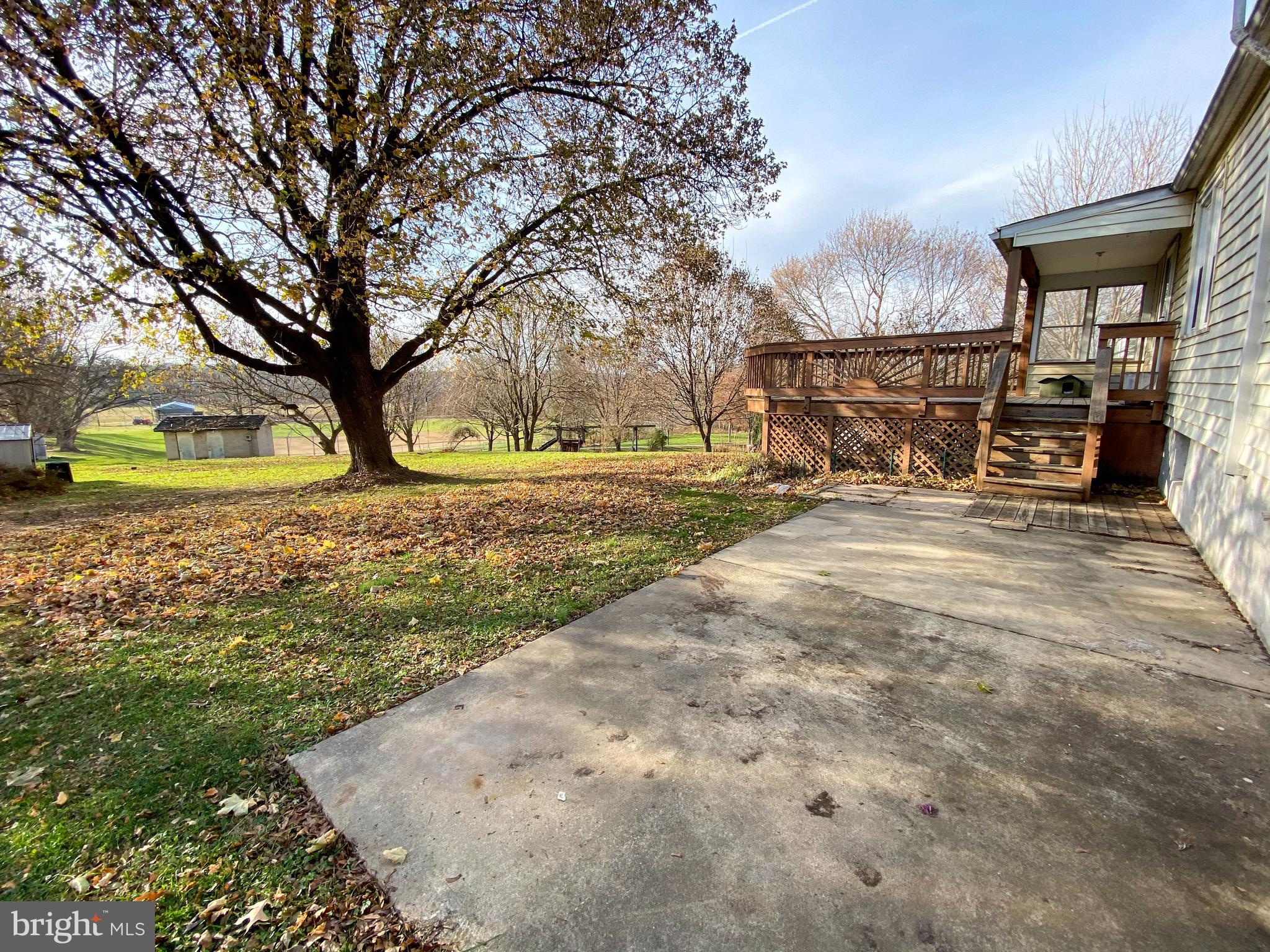 1026 Green Valley Road New Windsor, MD 21776 - Photo 52 of 57 a view of a yard with an outdoor space