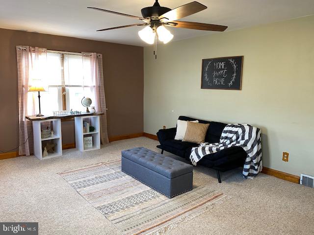 1026 Green Valley Road New Windsor, MD 21776 - Photo 54 of 57 a living room with furniture and a window