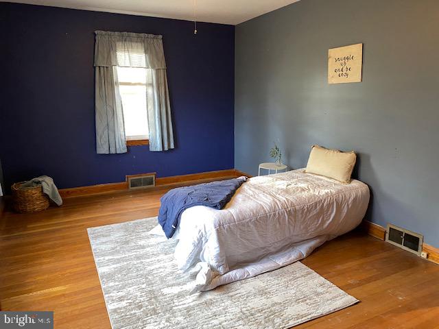 1026 Green Valley Road New Windsor, MD 21776 - Photo 56 of 57 a bedroom with a bed and a window