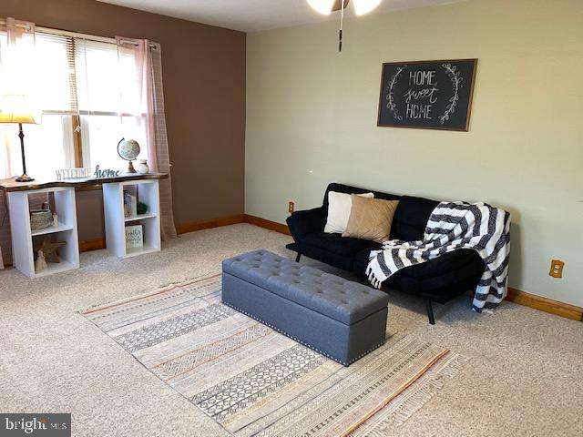 1026 Green Valley Road New Windsor, MD 21776 - Photo 6 of 57 a living room with furniture and a window