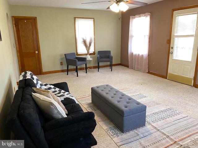 1026 Green Valley Road New Windsor, MD 21776 - Photo 7 of 57 a living room with furniture and a window