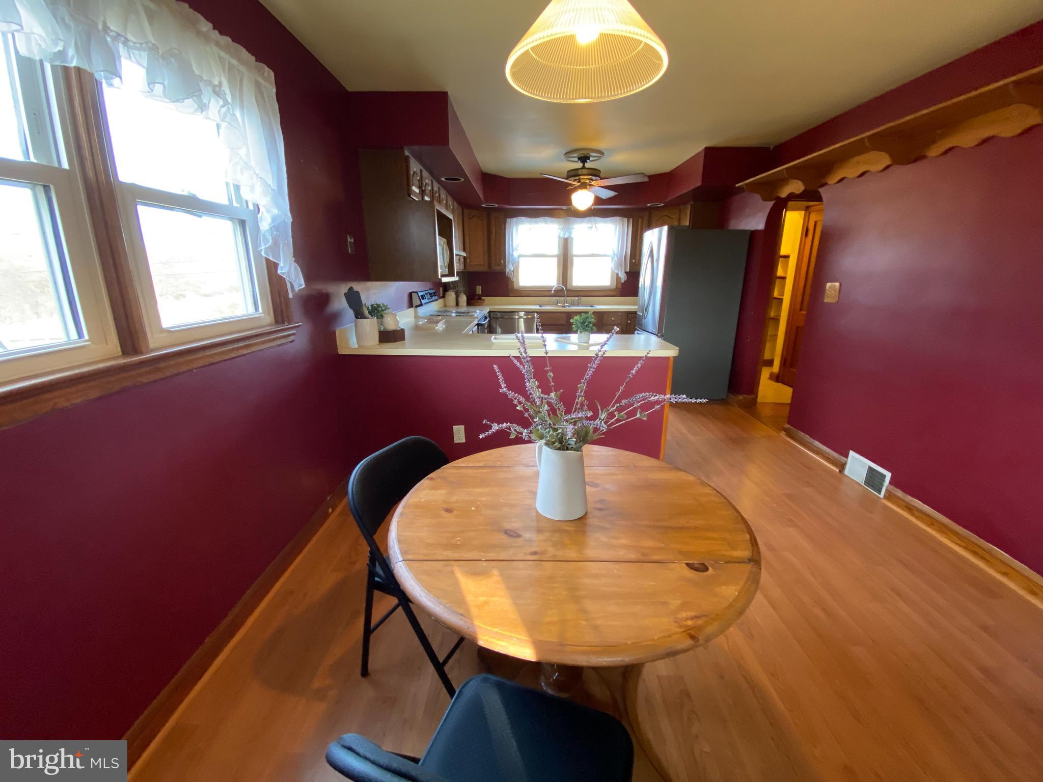 1026 Green Valley Road New Windsor, MD 21776 - Photo 10 of 57 a dining room with furniture and window