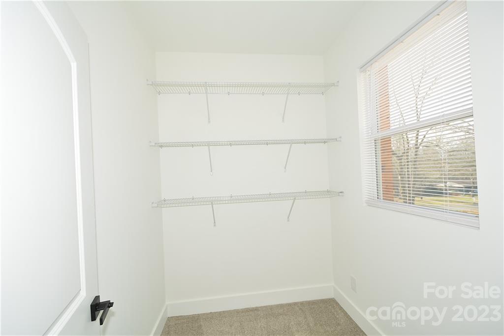 1511 Farm Road Shelby, NC 28152 - Photo 18 of 36 a view of a small space with racks on the wall
