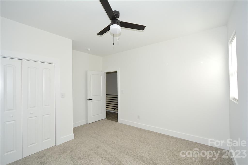 1511 Farm Road Shelby, NC 28152 - Photo 19 of 36 an empty room with ceiling fan
