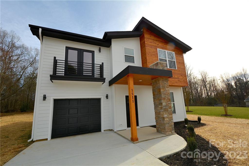 1511 Farm Road Shelby, NC 28152 - Photo 2 of 36 a front view of a house with a yard