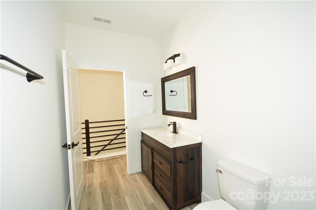 1511 Farm Road Shelby, NC 28152 - Photo 26 of 36 a spacious bathroom with a sink and a mirror