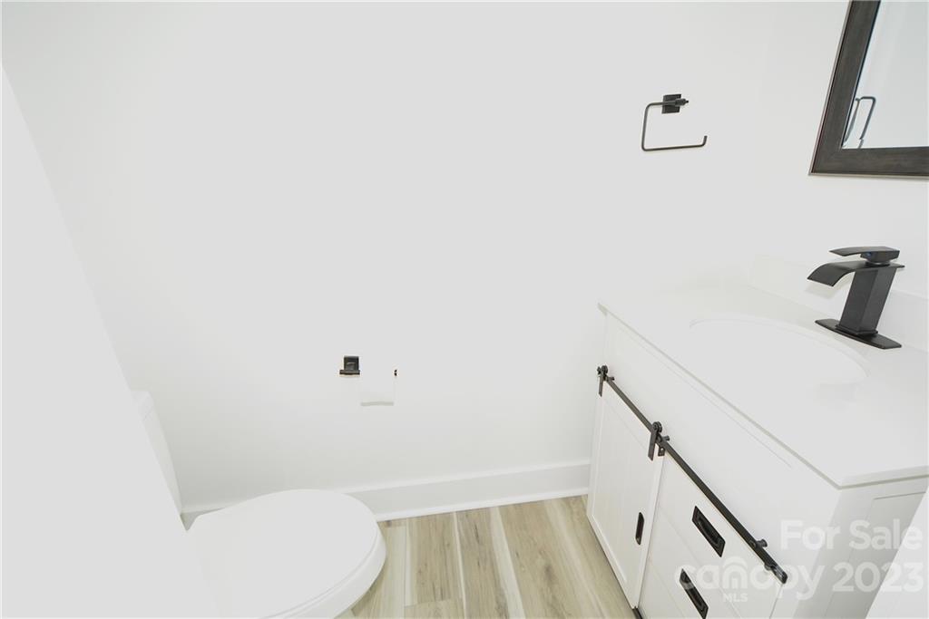 1511 Farm Road Shelby, NC 28152 - Photo 28 of 36 a bathroom with a sink and toilet