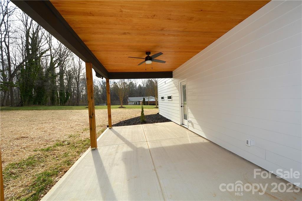 1511 Farm Road Shelby, NC 28152 - Photo 33 of 36 a view of a swimming pool with a yard
