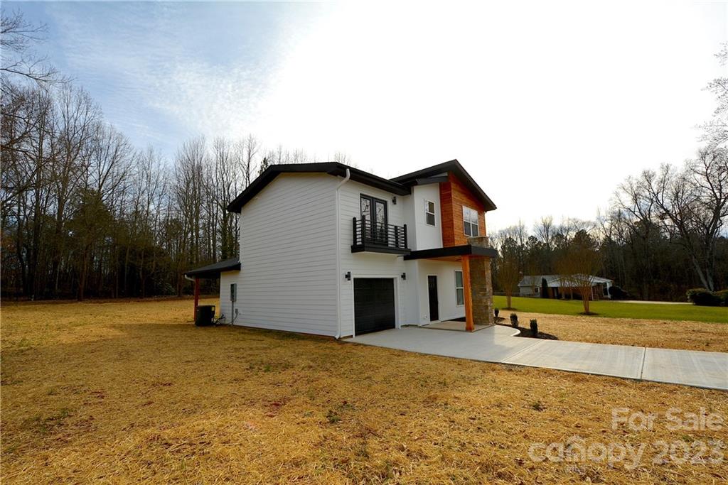 1511 Farm Road Shelby, NC 28152 - Photo 34 of 36 a view of a house with a yard