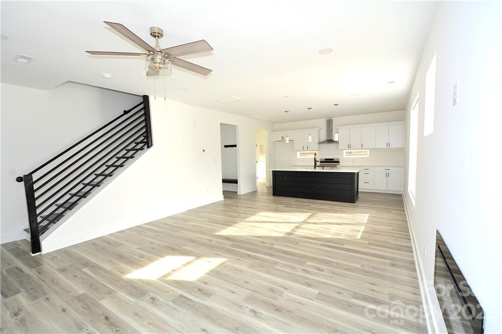 1511 Farm Road Shelby, NC 28152 - Photo 9 of 36 a view of kitchen and hall with wooden floor