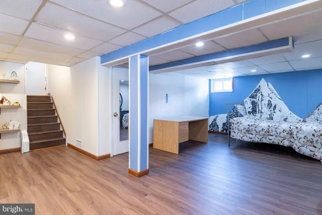 a view of livingroom with furniture and wooden floor