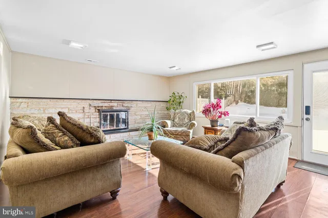a living room with furniture and a couch