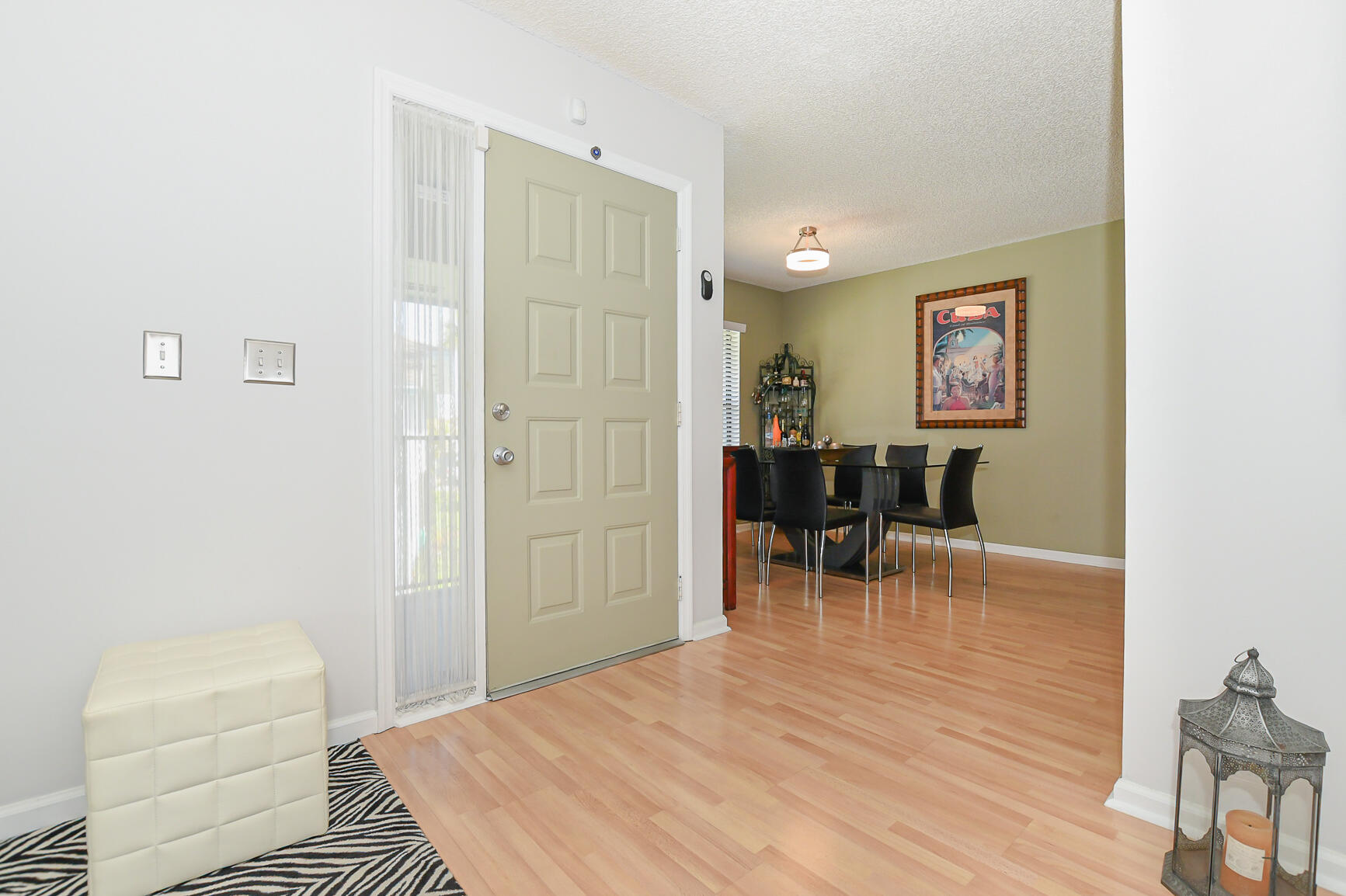 950 South Kanner Highway, Unit 905 Stuart, FL 34994 - Photo 11 of 34 a view of a room with chairs and wooden floor