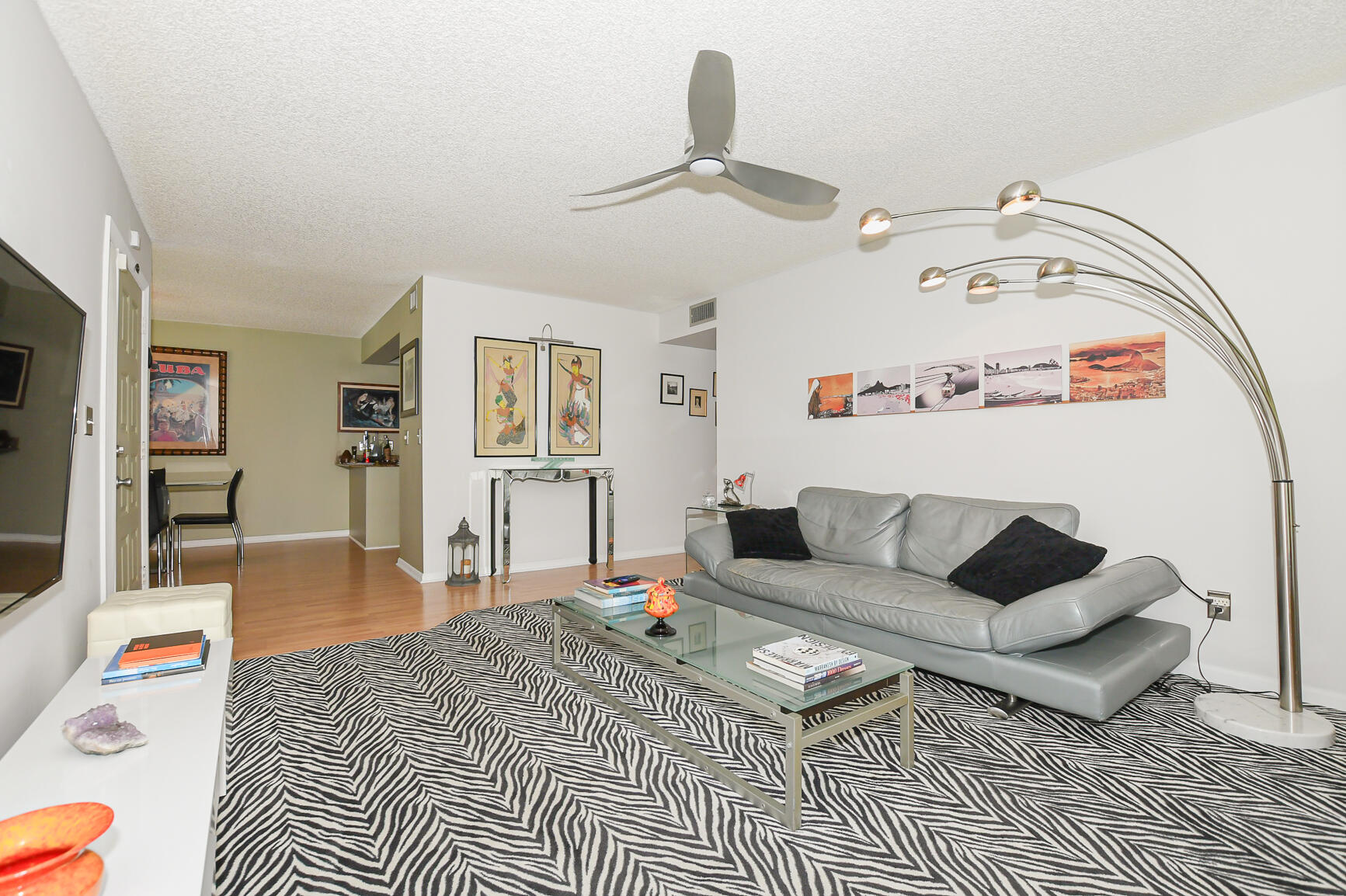 950 South Kanner Highway, Unit 905 Stuart, FL 34994 - Photo 16 of 34 a living room with furniture and wooden floor